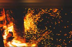 Molton fire with flickers of flame spinning off of it